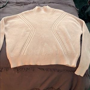 Super cute distressed pink sweater